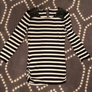 Black and white striped shirt with faux leather.